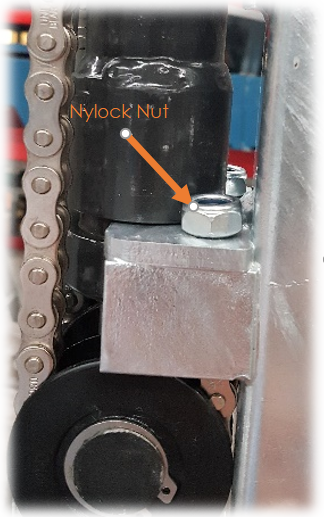 Illustration showing the Nyloc chain adjustment bolt on a MegaDumper