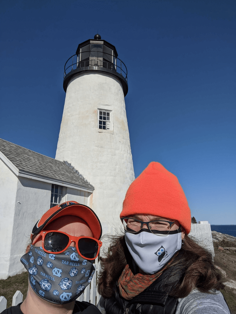 Kate and Tysa masked up at Pemaquid Point lighthouse in Maine