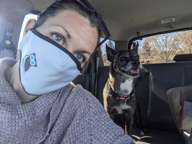 Marybeth masked up in Broomfield, Colorado with her dog Sally