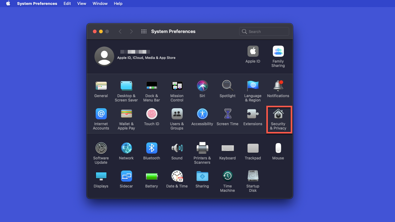 Captura de tela de uma área de trabalho do Mac com a janela de “Preferências do sistema” aberta. O ícone “Segurança e privacidade” está destacado em vermelho.