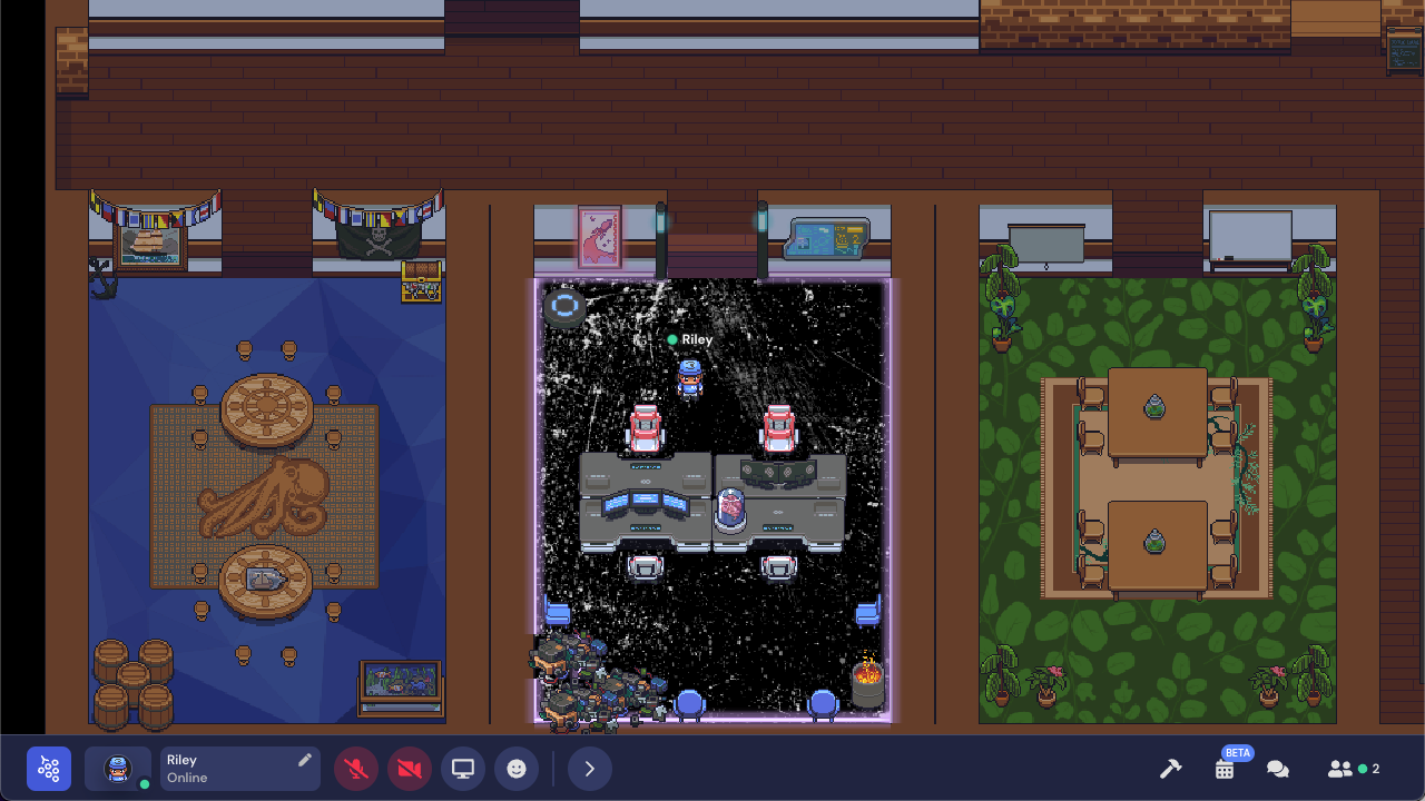 A screenshot of the office complex, focused on the two conference rooms in the bottom left of the map. A character named AJ (They/Them) is standing alone in a nautical-themed room, which has two circular tables, several barrels, a treasure chest, a ship painting, a pirate flag, and bunting. In the cyberpunk themed conference room to the right, four grey desks are grouped together, with a brain in a jar resting on top. Piles of waste and a trash barrel fire are in the room, as well as a neon image of a rocket and a digital map on the wall.  