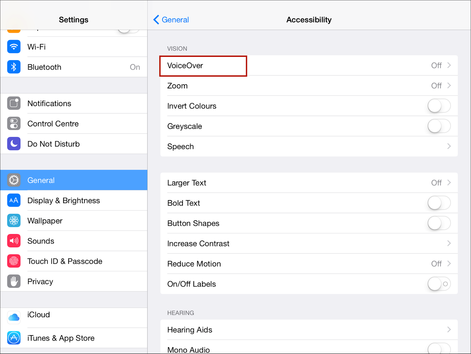 iOS settings page with general selected and voice over highlighted