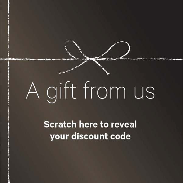 Example of a scratch-off lightbox with the text 'A gift from us. Scratch here to reveal your discount code.' A scratch-off animation reveals the text '20 percent off. Enter code discount2022 at checkout.'