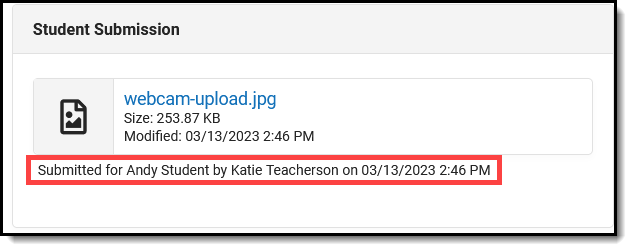Screenshot of the text that displays when a teacher submits an assignment on behalf of a student, including teacher name and timestamp. 