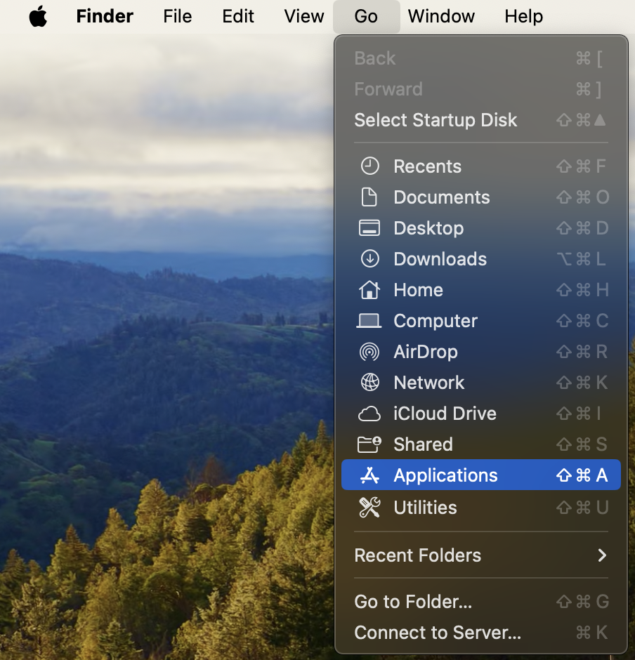 Mac menu bar with Go menu open and Applications selected