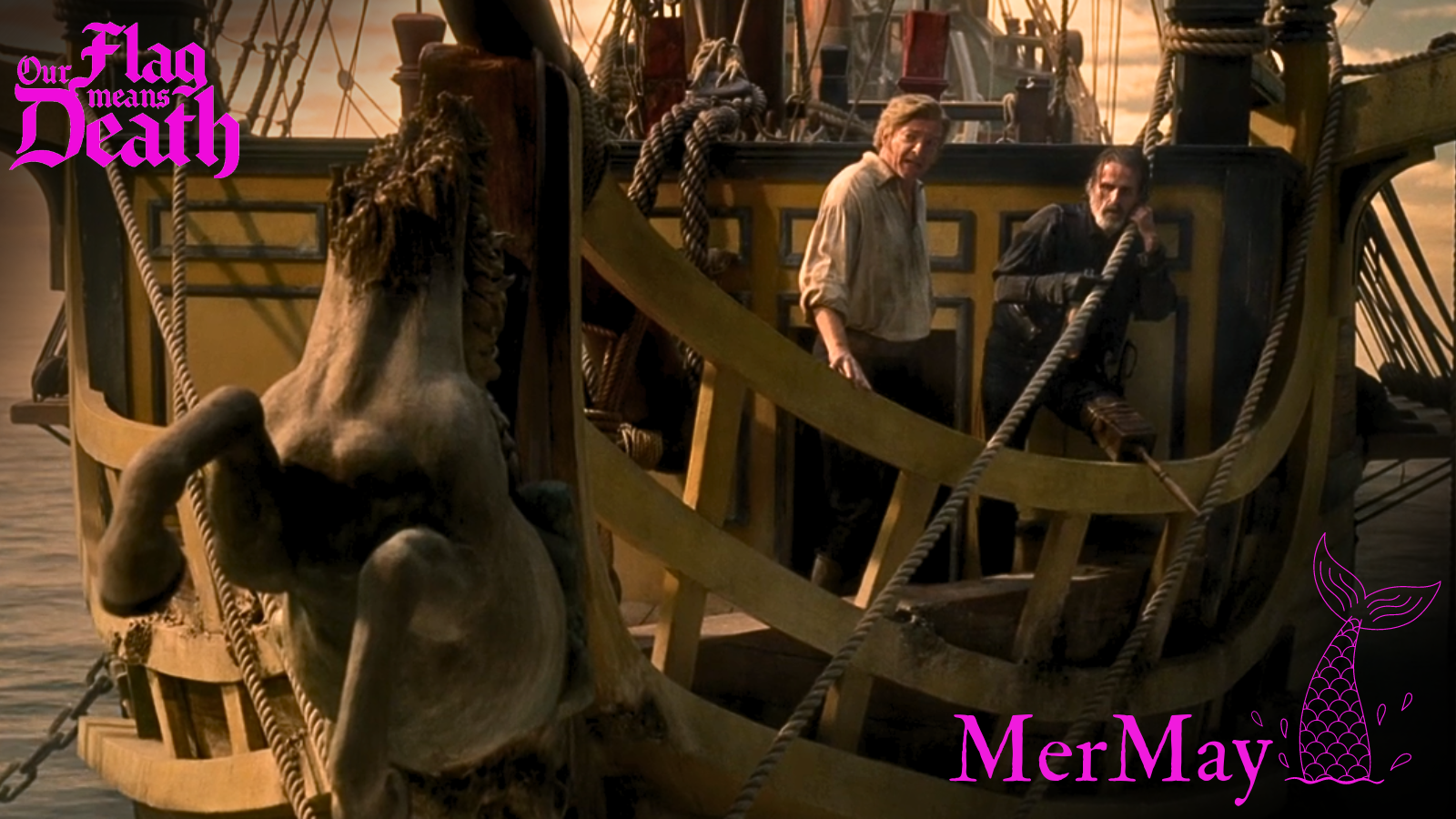 A still from the show, overlaid with the SaveOFMD Crew MerMay 2024 sticker. The still shows Stede and Izzy standing at the prow of the ship, looking at the unicorn figurehead. Izzy has a wooden peg leg, and the unicorn has no head. 
