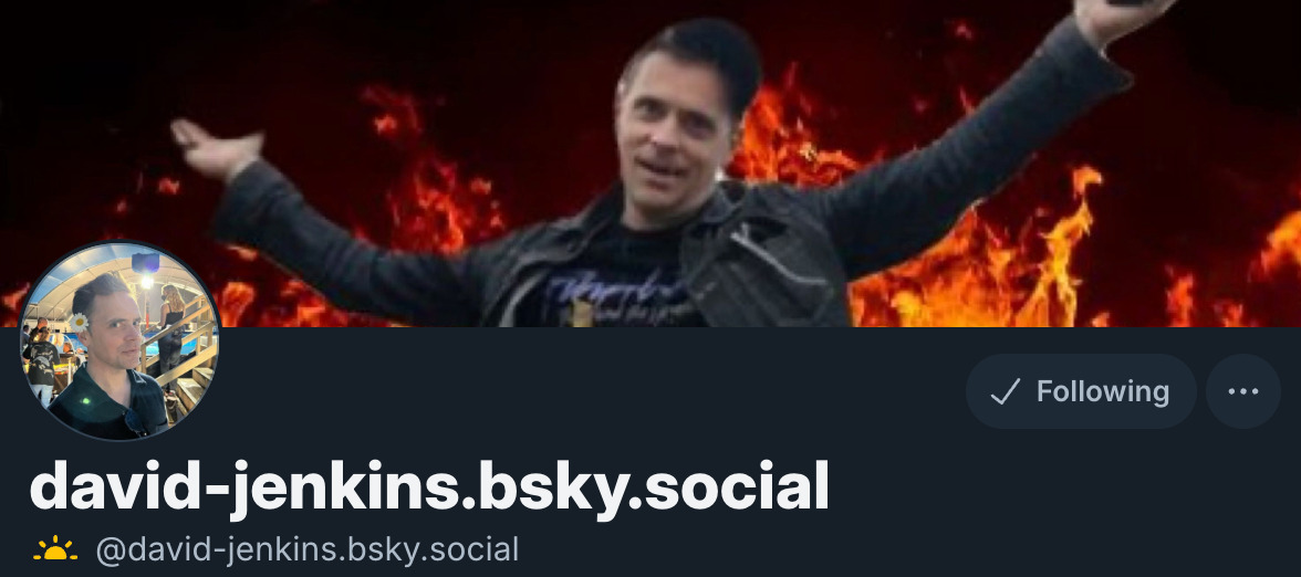 Image of a bluesky profile, david jenkins handle david-jenkins@bsky.social. The cover banner is of david jenkins holding his arms out in front of fake fire. 