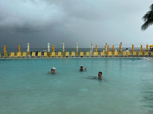 David swimming with friends