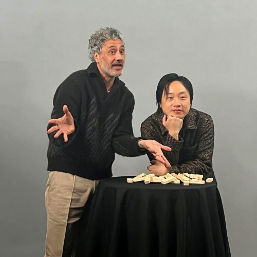 Taika waititi and Jimmy o Yang are playing jenga and it collapses