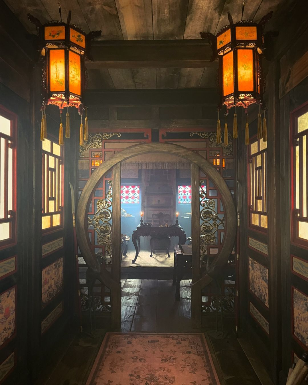 Picture of Zheng's hallway with red lanturns adorning it. https://www.instagram.com/p/DClqtSIJDgv/?img_index=1