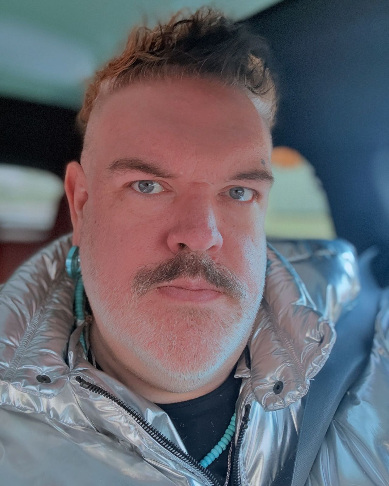 Selfie posted by Kristian Nairn. Only his mustache and some very short white stubble is left of his beard.