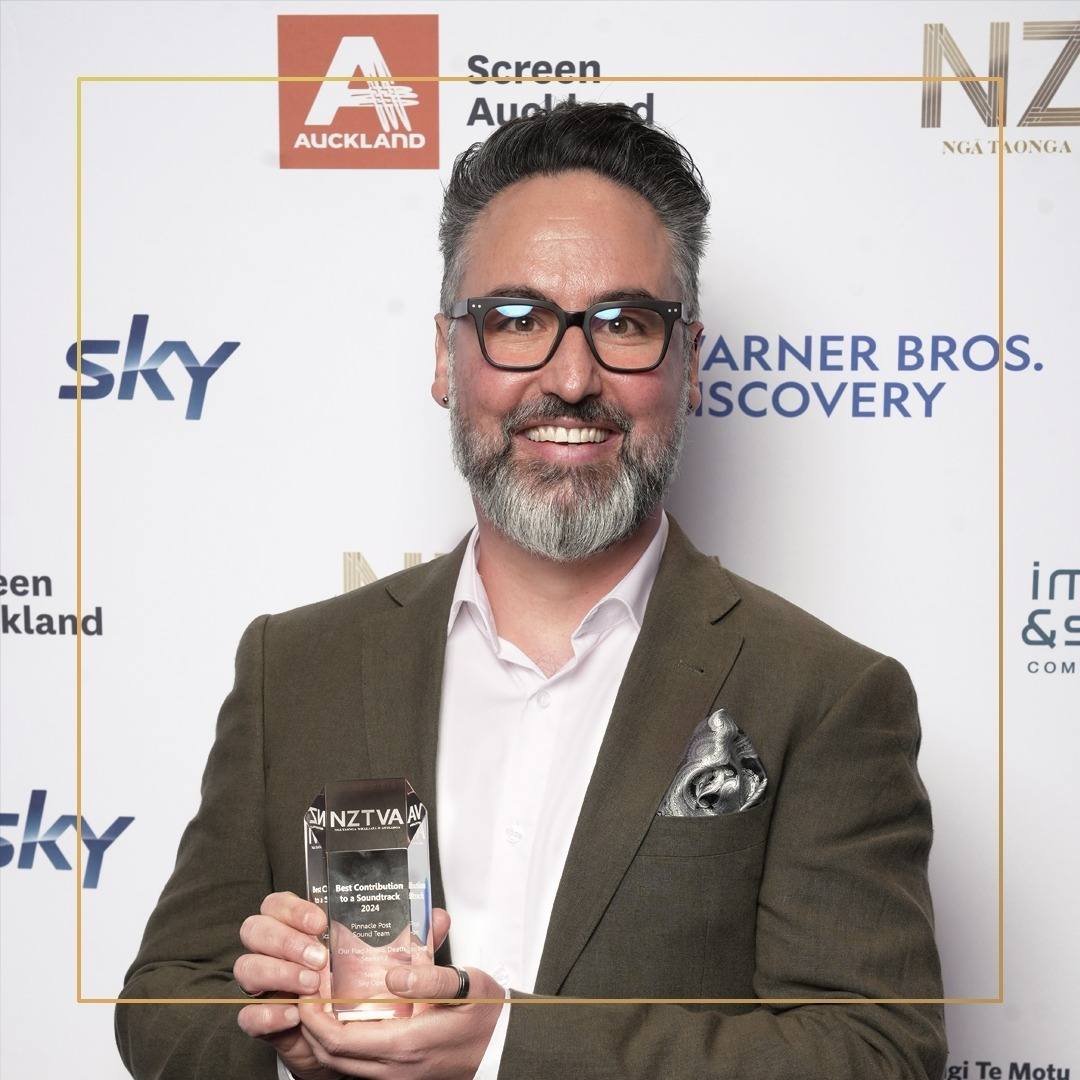 Photo of Pinnacle Post's founder, Damien Del Borrello, holding his NZTV award at the awards ceremony.