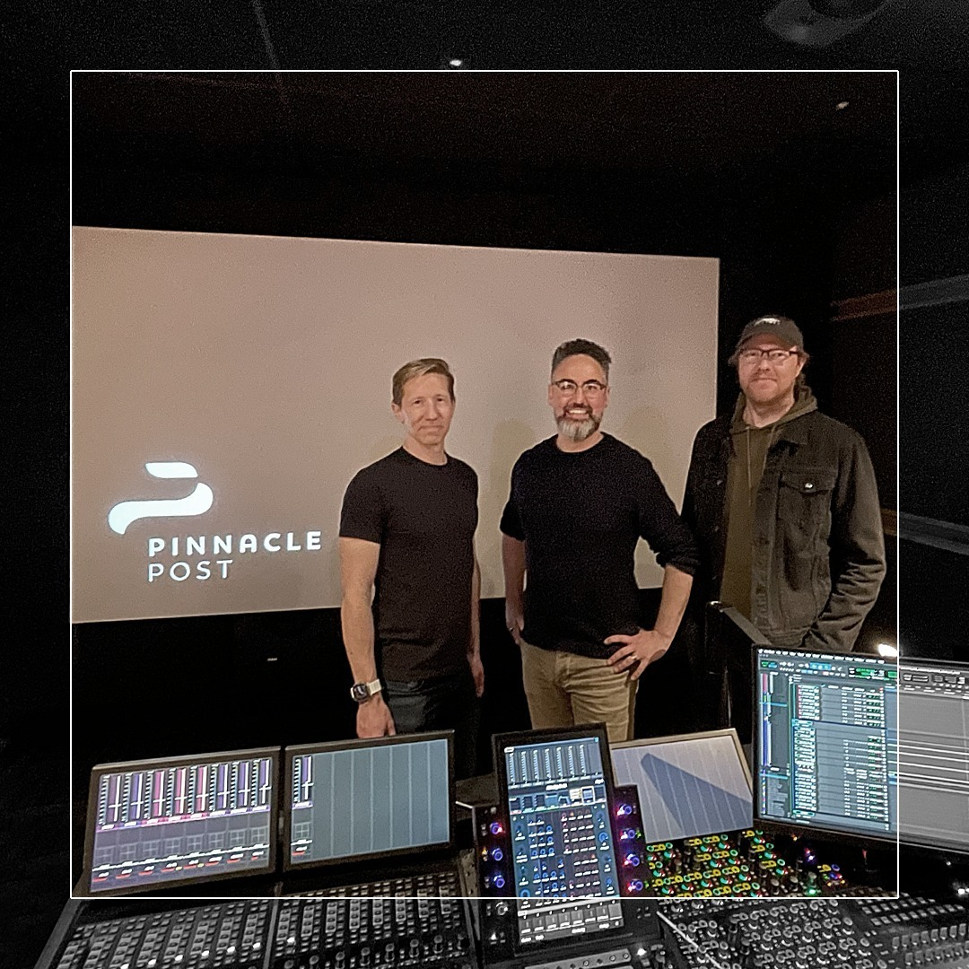 Photo of three male Pinnacle Post staff members in the studio.