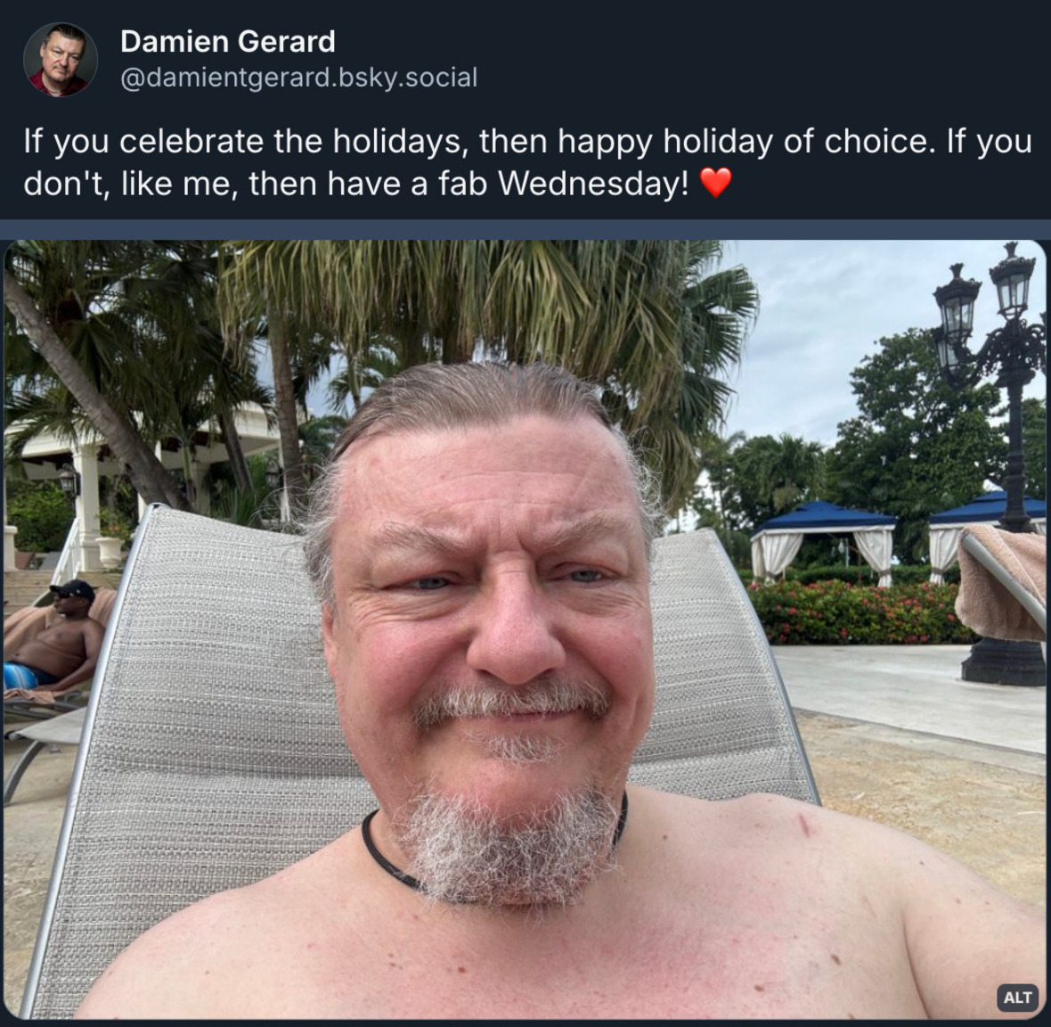 Bluesky post by Damien Gerard with a selfie of Damien relaxing on a deck chair: 