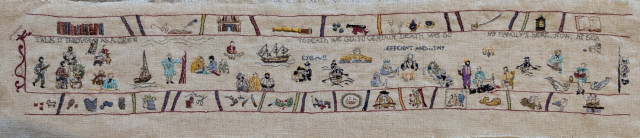 Image description by the artist: Small embroidery (roughly 45 cm long by 7 cm high) in the style of the Bayeux Tapestry. The central panel depicts episode 1 of the TV show Our Flag Means Death, with smaller panels above & below featuring additional scenes and items from the episode.