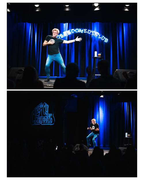 Two more photos from Rhys's show. In the one at the top, Rhys's right leg is slightly bent and he is holding his right hand to his chest while reaching out to the left with his other hand. In the bottom picture, he is seen from further away, crouching down a little with both legs bent and his right heel raised while his toes still touch the ground. His hands are raised to about chest height as if to snap his fingers, though it is hard to tell at this distance.