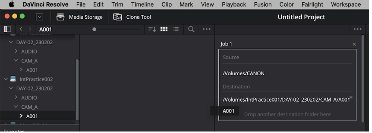 "A001" volume from the "IntPractice002" drive being dragged from the left side of the interface to the Destination section of Clone Job 1.