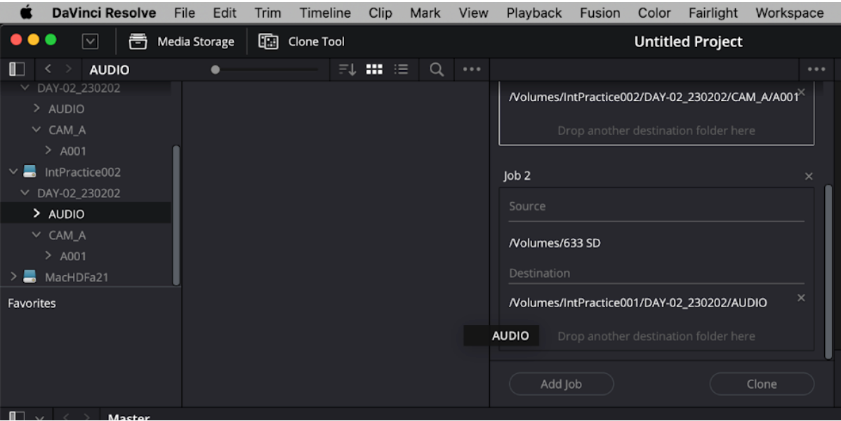 "AUDIO" folder from the "IntPractice001" drive being dragged from the left side of the interface to the Destination section of Clone Job 2.